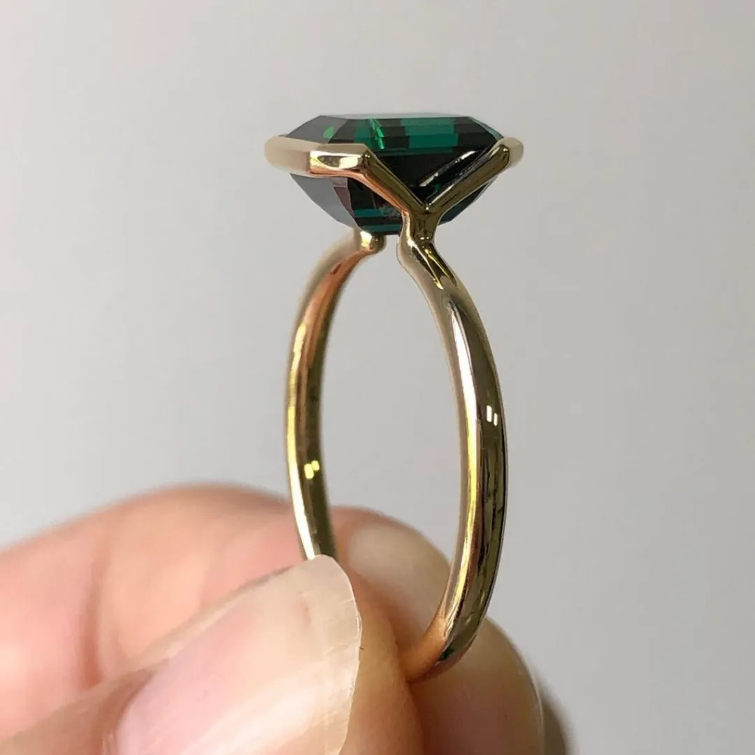 /public/photos/live/Half Bezel Set Moissanite Green Emerald Ring 510 (2).webp